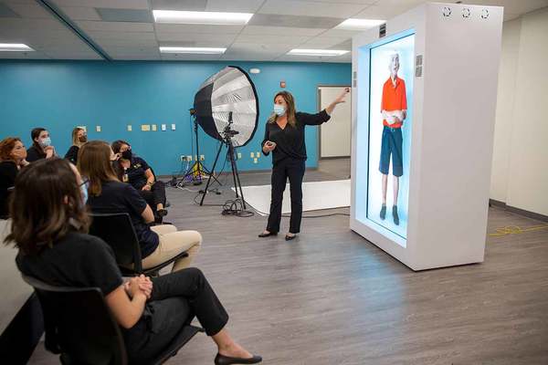 Picture of Bari Hoffman demonstrating UCF's Doctor Hologram